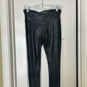 Black faux leather leggings. Size Large.